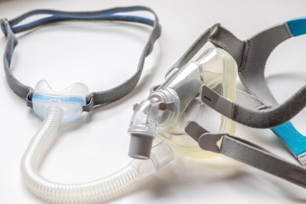 A full face cpap mask against a white background