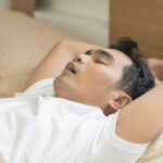 Middle-aged Asian men have problems breathing and snoring concepts