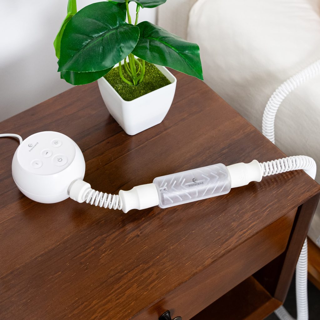 Transcend Micro Travel Auto CPAP Machine on a bedside table