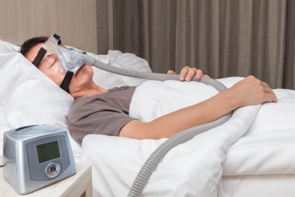 man using an APAP machine