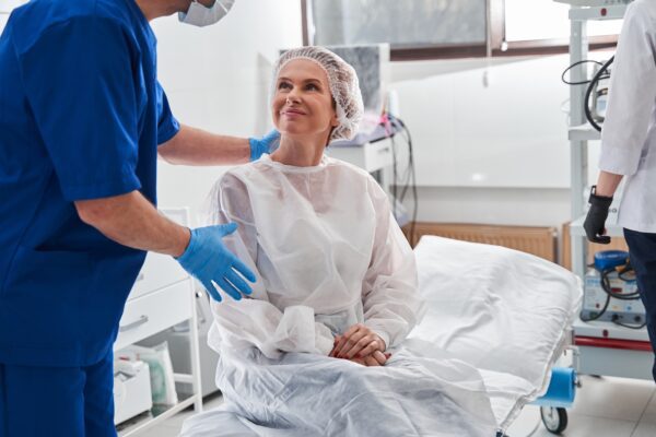 Doctor talks to patient before surgery